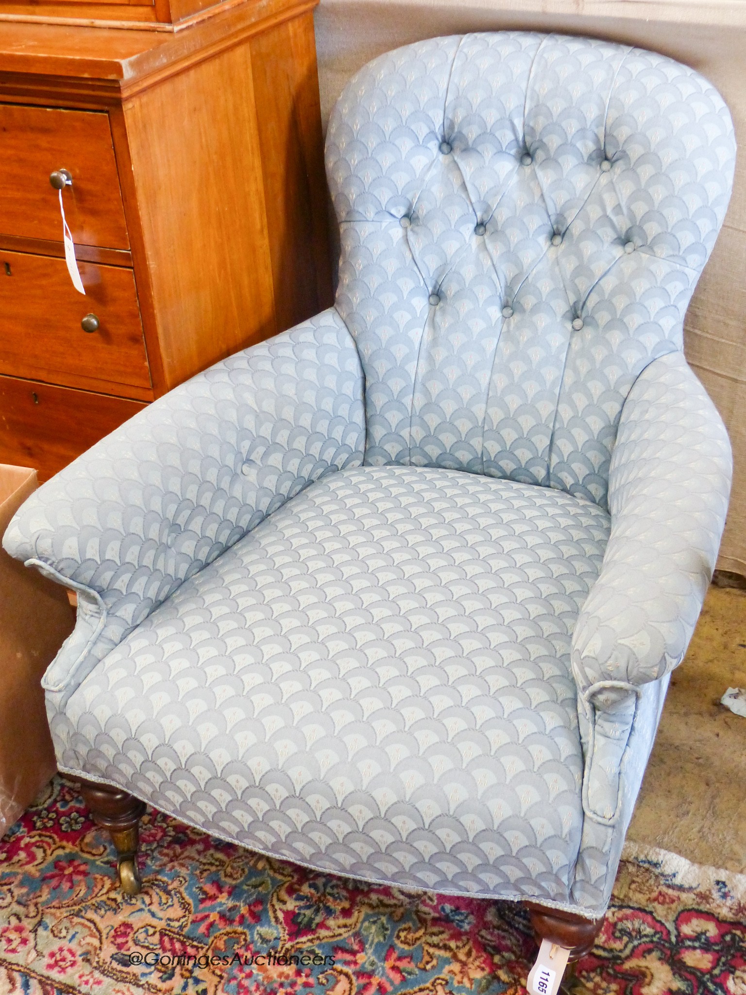 A Victorian walnut library chair by Charles Hindley & Sons
